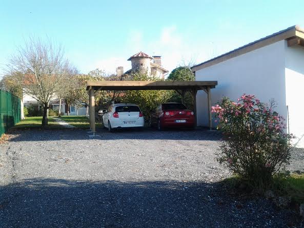 Carport double à toit plat 