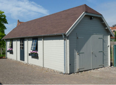 Grand garage style cottage en bois brut - 47m2