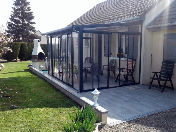 Un jardin d'hiver possible grâce à ce toit terrasse aluminium 